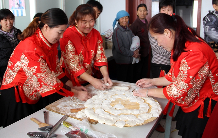 三八节包饺子活动图片